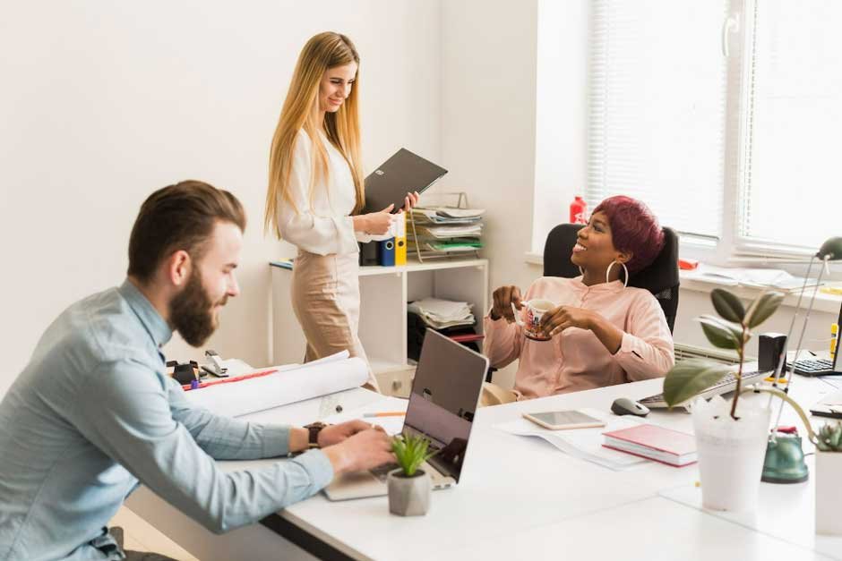 businessman giving presentation to colleagues in conference room